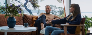 Two people relaxing in livingroom